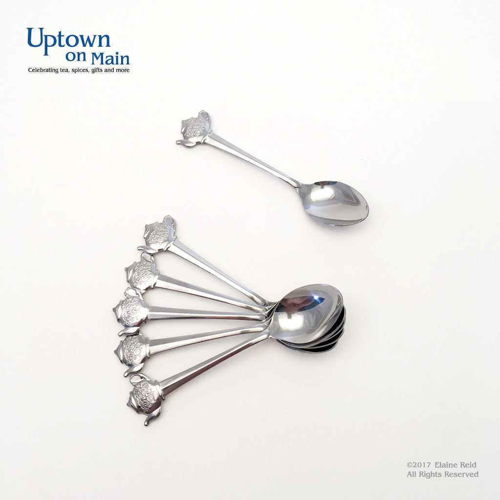 Spoon with teapot handle
